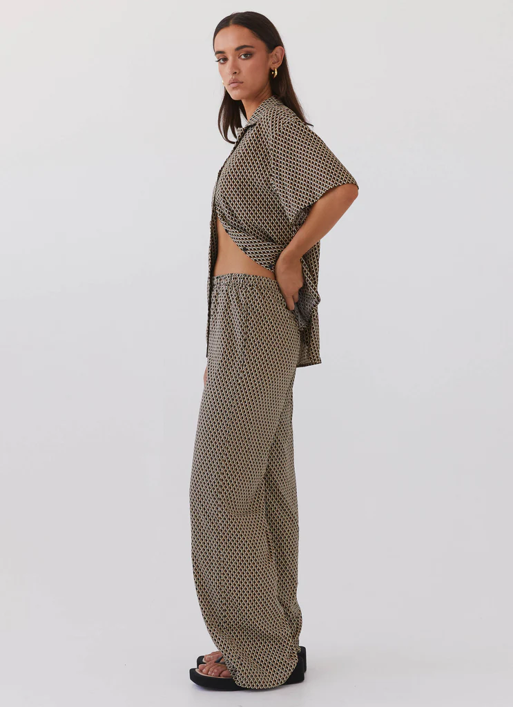 Pantaloni Larghi Bruno – Geometria Marrone Pantaloni Larghi Bruno - Geometria Marrone