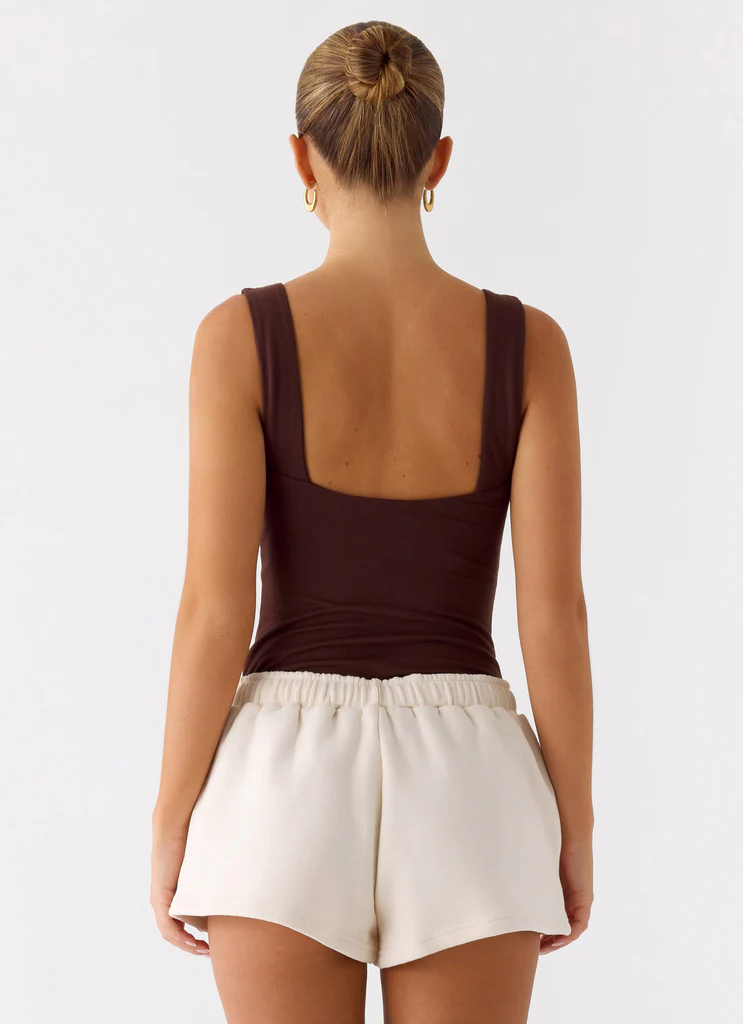 Shorts da training a vita bassa Signature - Avorio